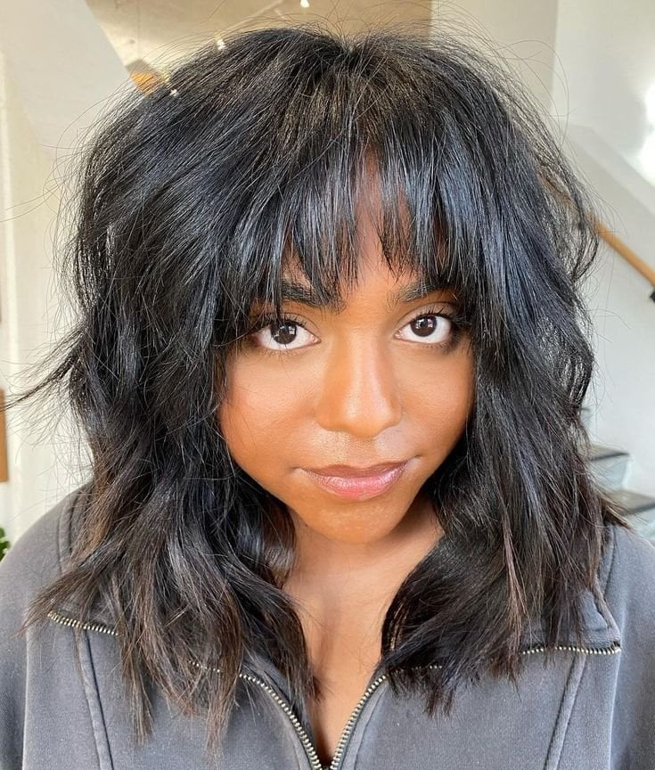 Mid-Back Shag With Textured Blunt Bangs Mid-Back Shag With Textured Blunt Bangs — Trendy Bangs Style
