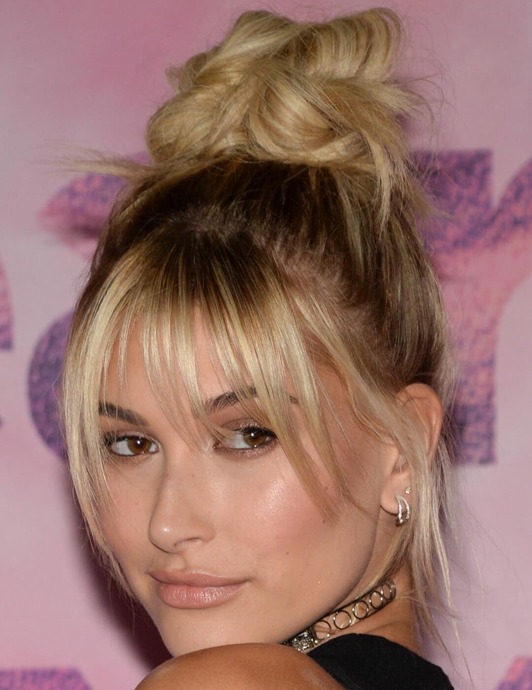 Blonde Updo With Face-Framing Butterfly Bangs Blonde Updo With Face-Framing Butterfly Bangs — Trendy Bangs Style