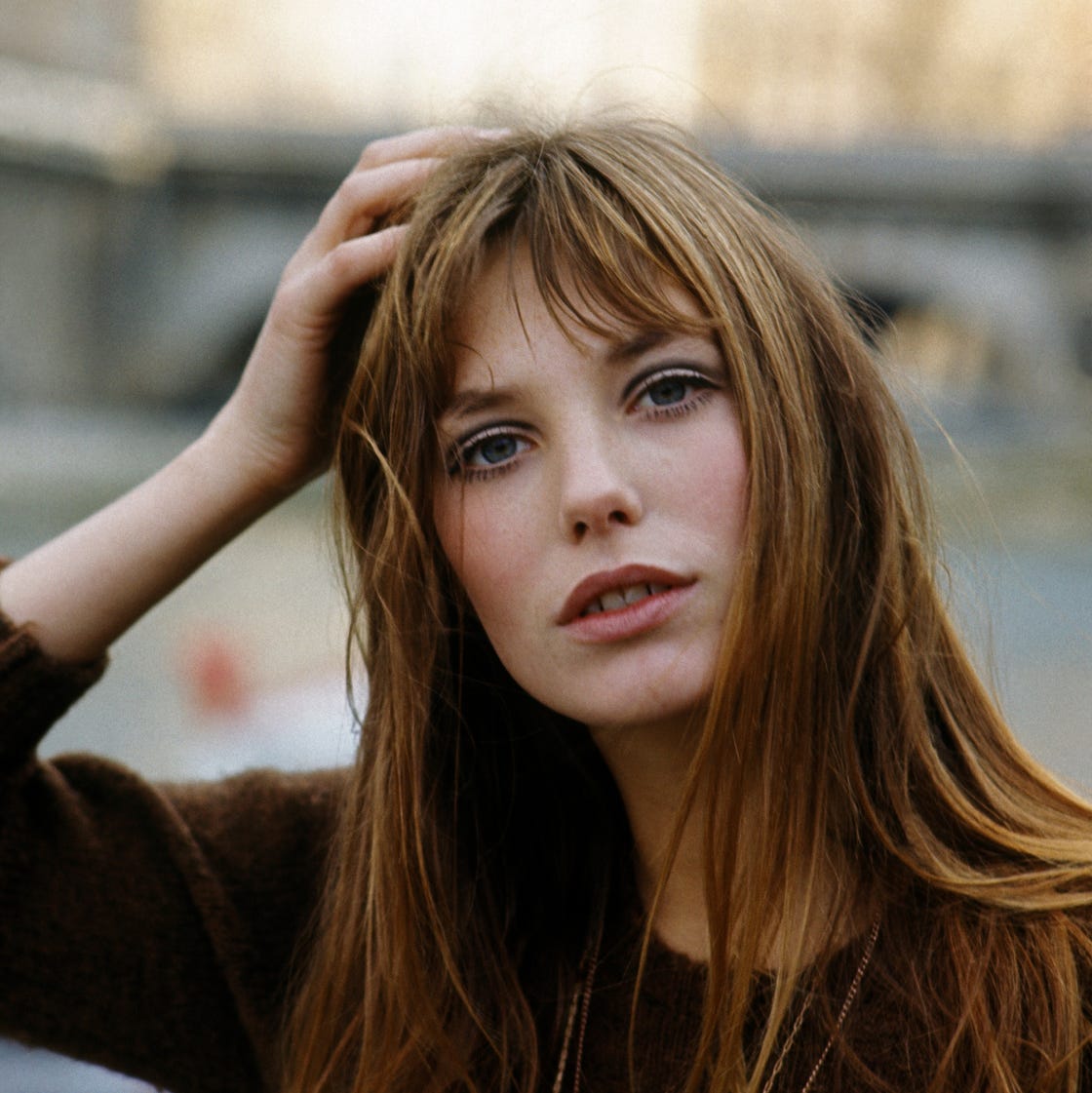 Mid-Back Layers With Dark Brown Face-Framing Bangs Mid-Back Layers With Dark Brown Face-Framing Bangs — Trendy Bangs Style