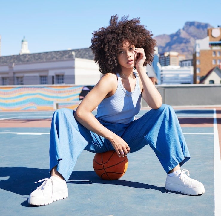 Voluminous Dark Brown Afro — Trendy Basketball Hairstyles