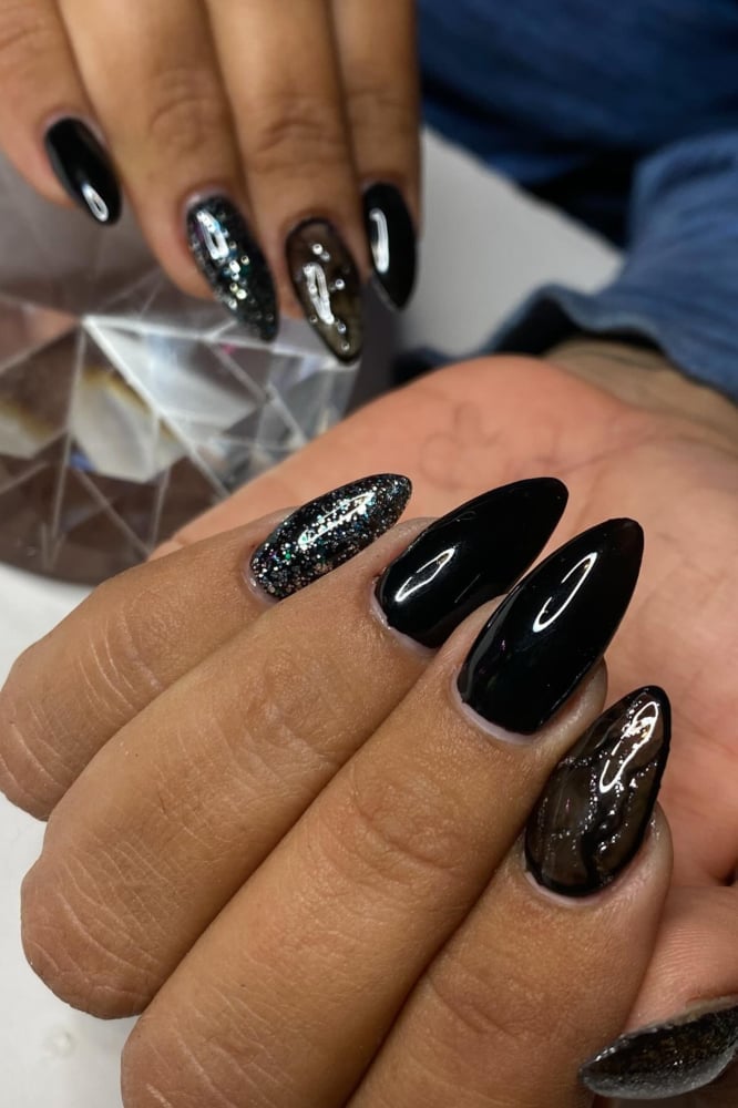 Glossy Black Gold Foil Accent Medium Almond Nails Glossy Black Gold Foil Accent Medium Almond Nails — Trendy Black Almond Nails