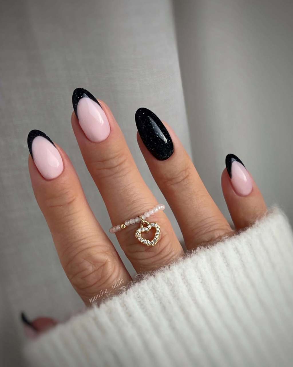 Sheer Nude Black French Tip Black Glitter Accent, Everyday Version Sheer Nude Black French Tip Black Glitter Accent, Everyday Version — Trendy Black Almond Nails