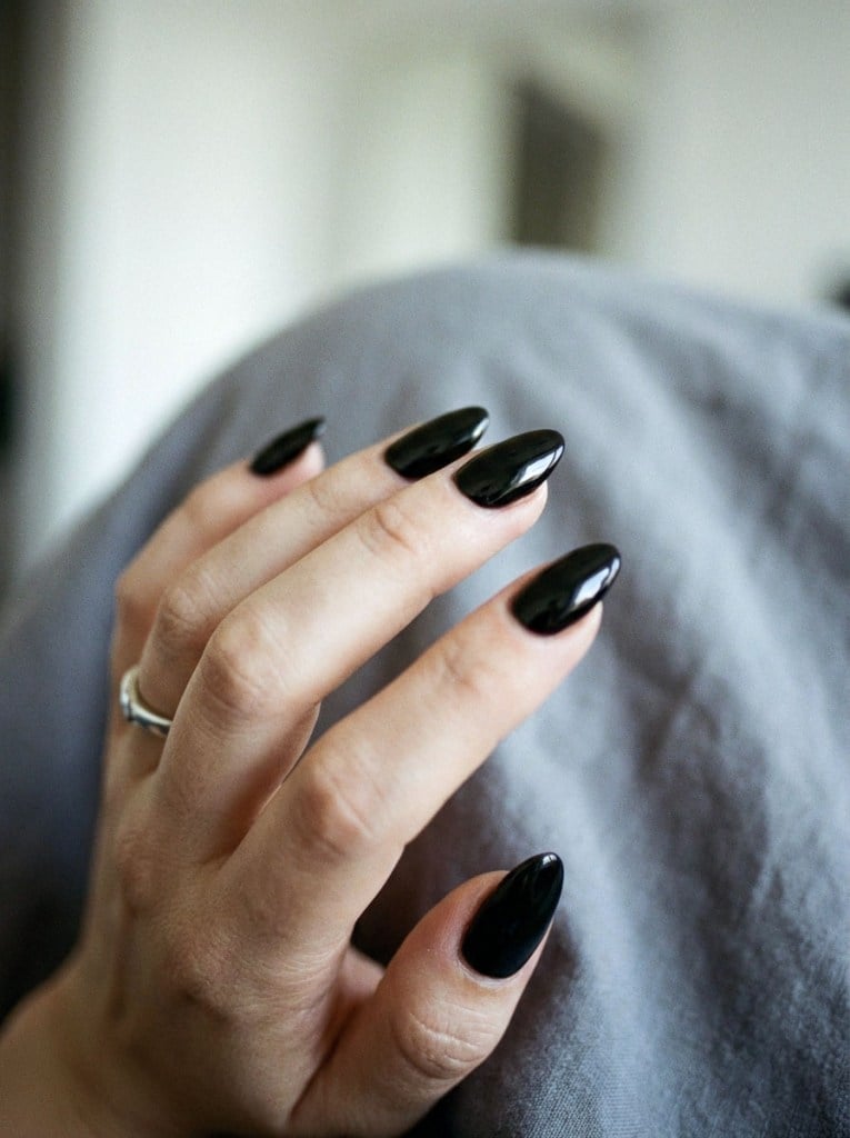 Deep Black Glossy Medium Almond Nails Deep Black Glossy Medium Almond Nails — Trendy Black Almond Nails