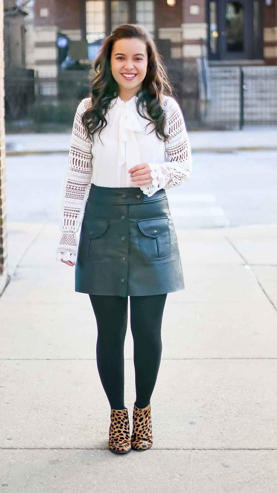A-Line Skirt With Bow-Neck Blouse and Animal Print Boots — Trendy Black Leather Skirt Outfit