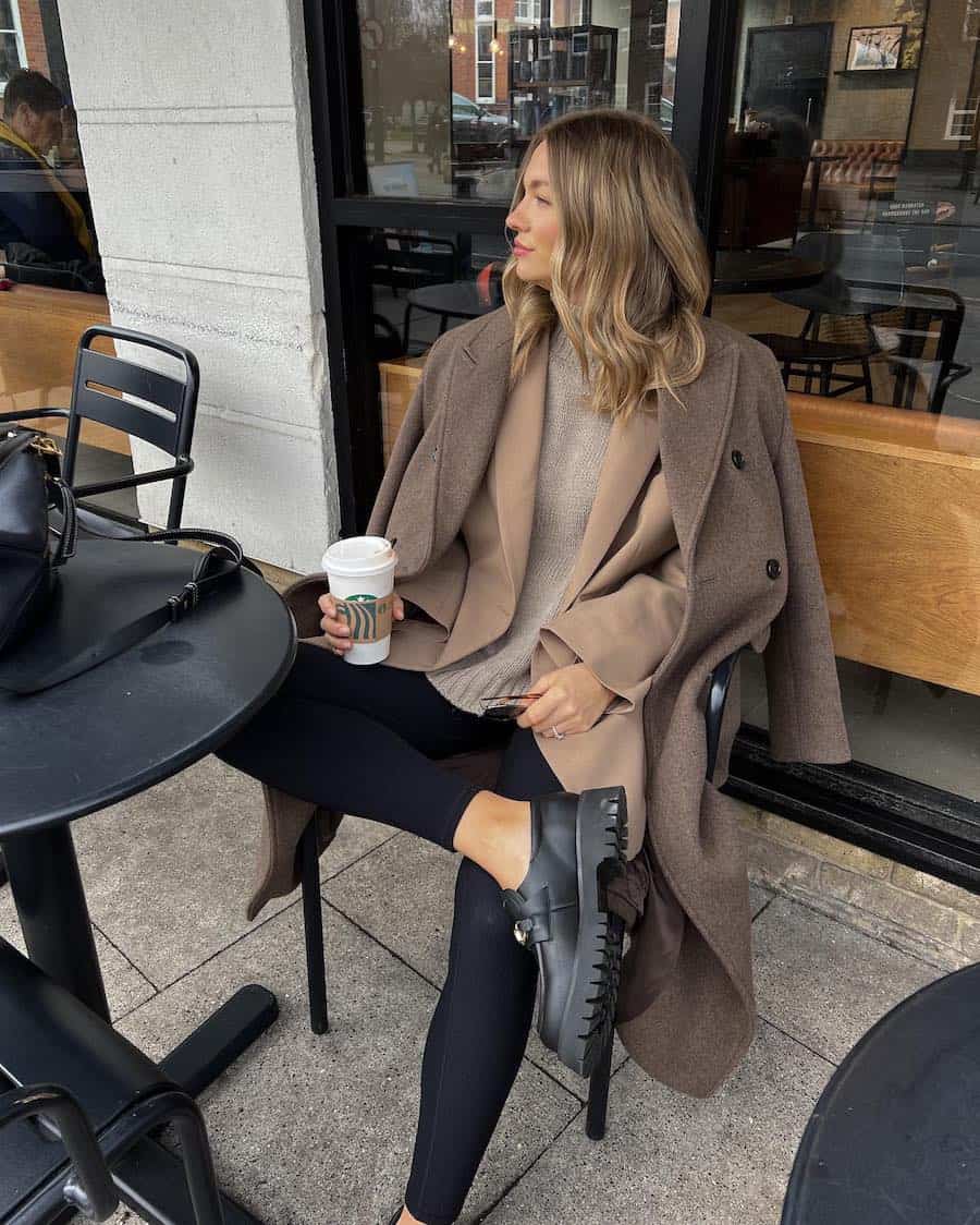 Chunky Black Loafers With Leggings And Coat — Trendy Black Loafers Outfit