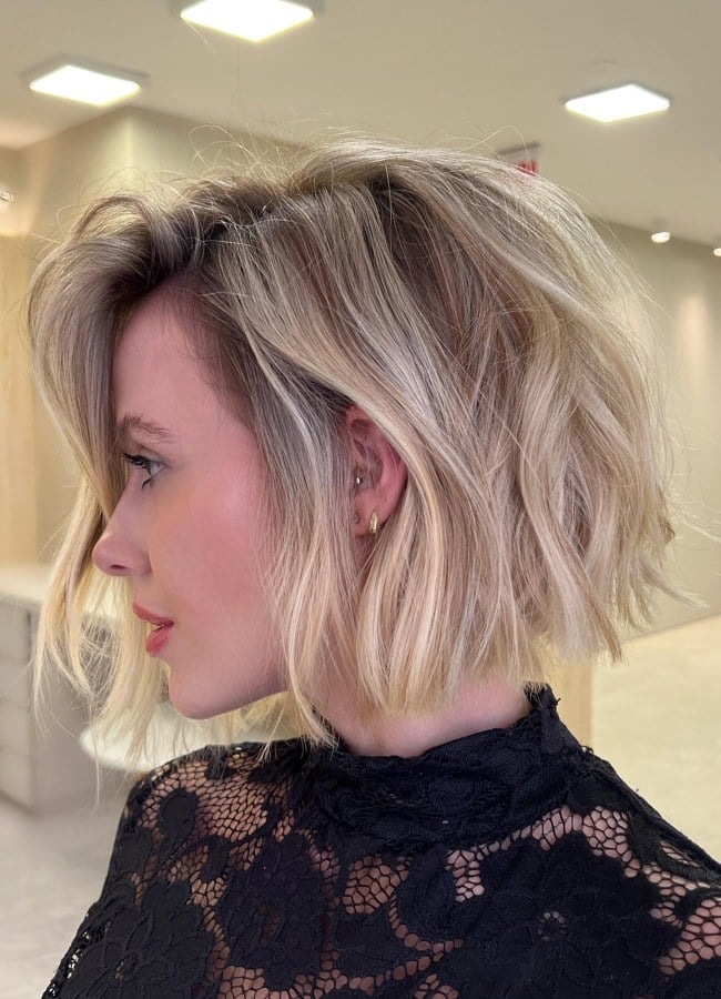 Chin Length Ash Blonde Bob With Side-Swept Bangs — Trendy Blonde Bob