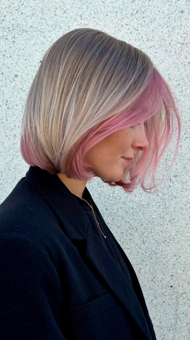 Chin Length Blonde Bob With Pink Highlights — Trendy Blonde Bob