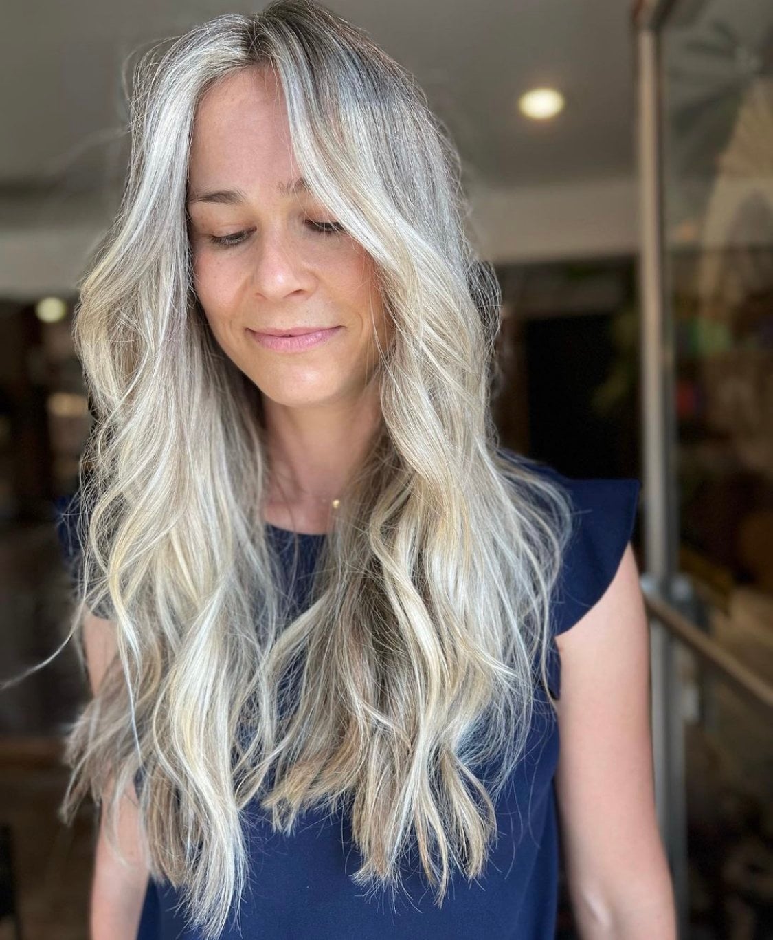 Mid-Back Blended Ash Blonde Highlights Mid-Back Blended Ash Blonde Highlights — Trendy Blonde Hairstyles