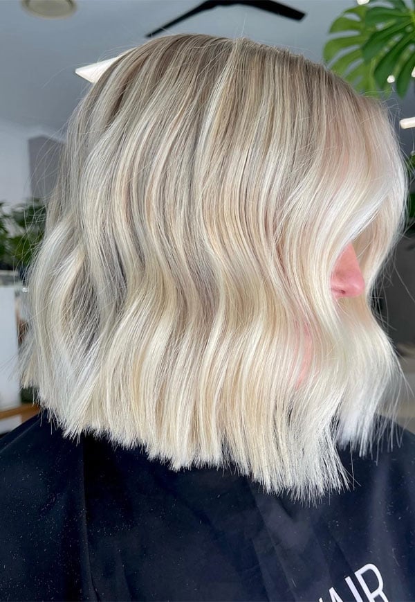 Chin Length Frosty Blonde Blunt Bob — Trendy Blonde Wavy Hair