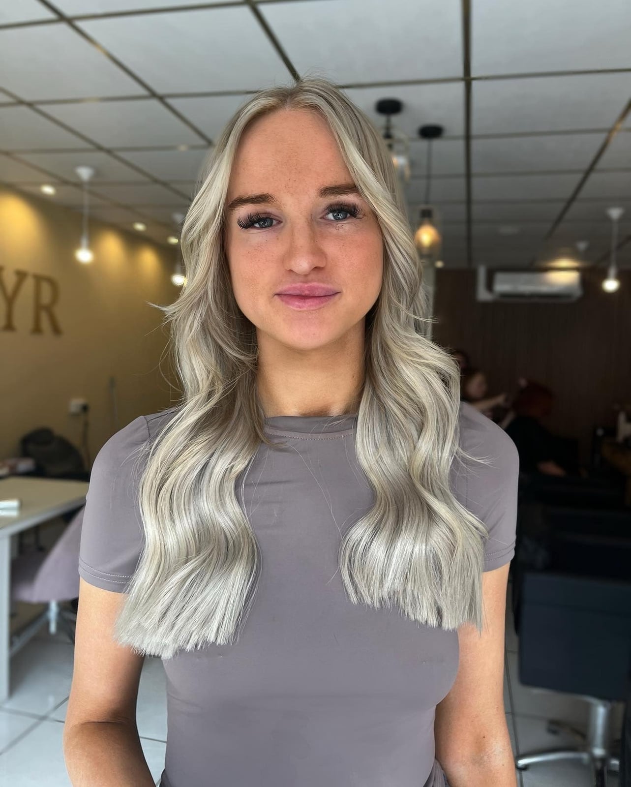 Shoulder Length Icy Blonde Waves — Trendy Blonde Wavy Hair