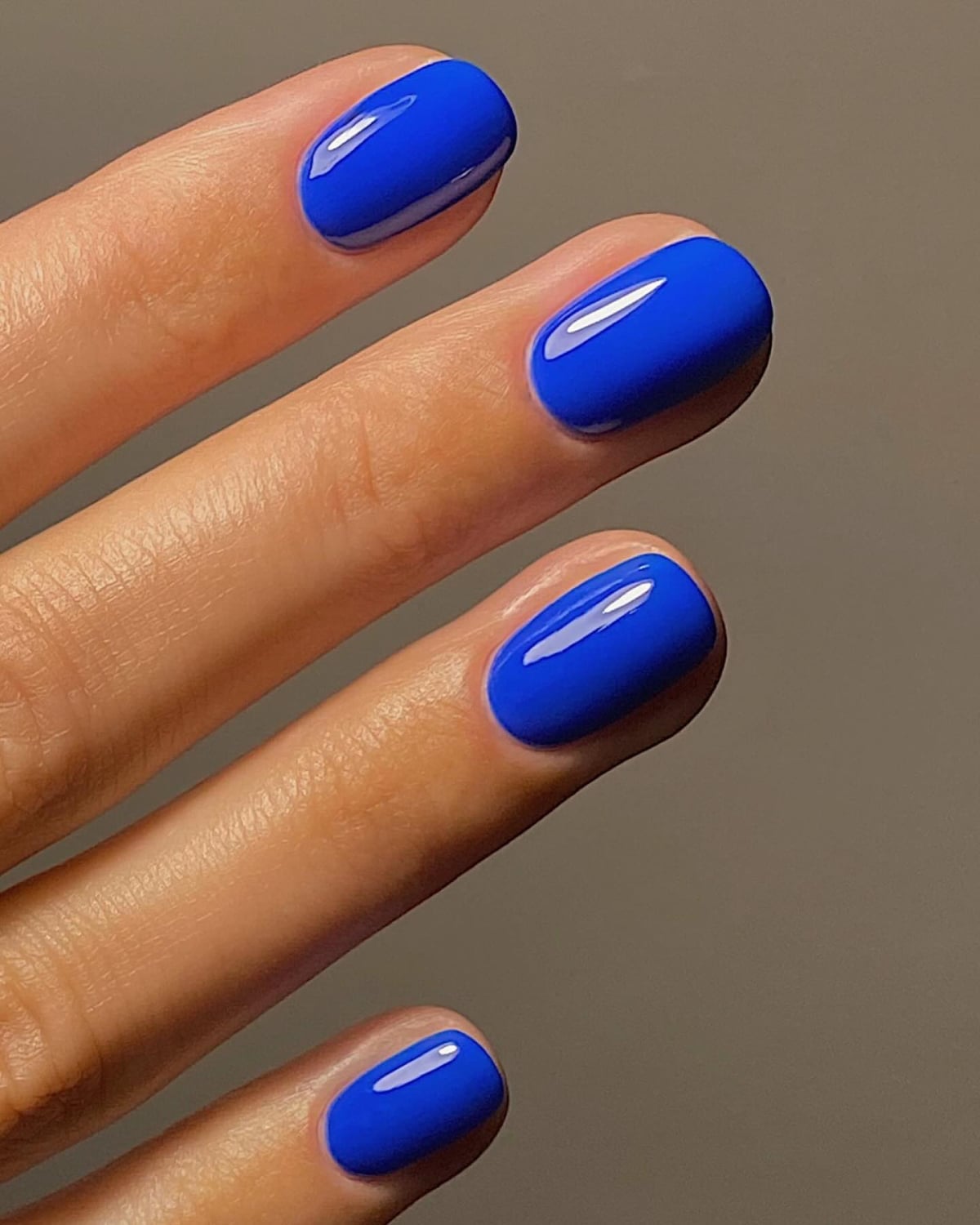 Short Oval Electric Blue High Gloss Nails Short Oval Electric Blue High Gloss Nails — Trendy Blue Acrylic Nails
