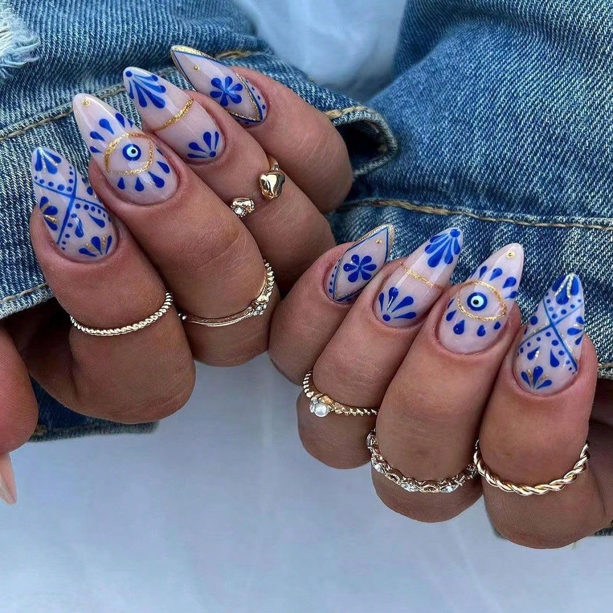 Long Almond Blue Pattern Gold Accent Nails Long Almond Blue Pattern Gold Accent Nails — Trendy Blue Acrylic Nails