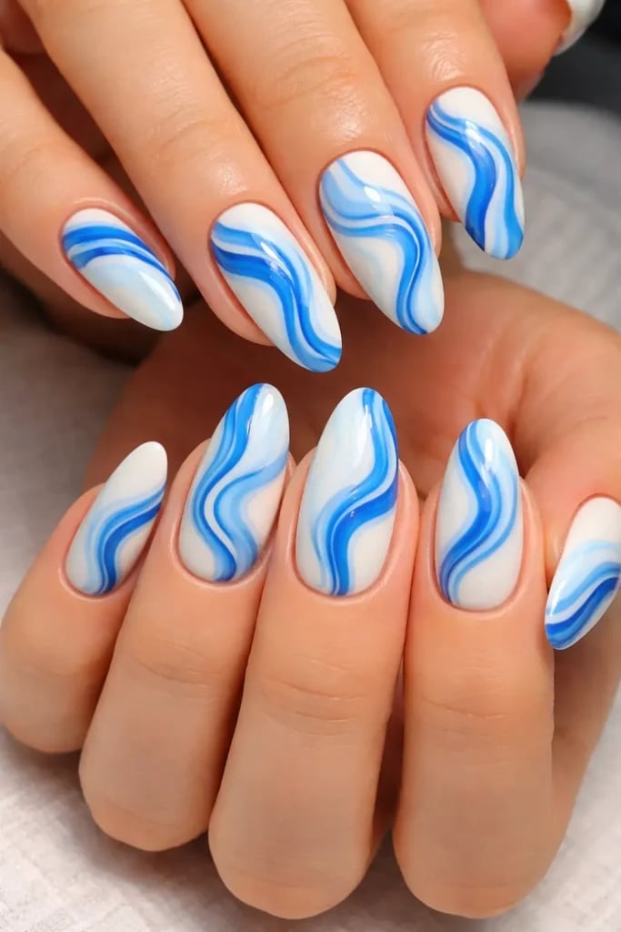 Medium Almond Blue White Marble Swirl Nails, Glossy Medium Almond Blue White Marble Swirl Nails, Glossy — Trendy Blue Acrylic Nails