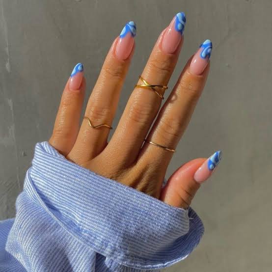 Sheer Pink Abstract Blue Swirl Almond Nails Sheer Pink Abstract Blue Swirl Almond Nails — Trendy Blue Almond Nails