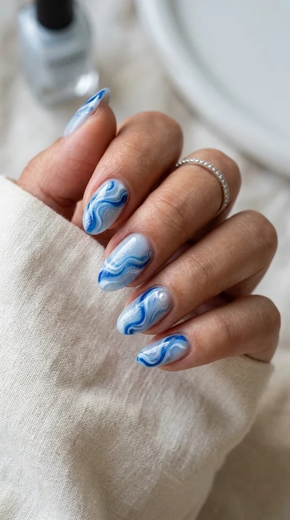 Light Blue White Dark Blue Marble Pearl Almond Nails Light Blue White Dark Blue Marble Pearl Almond Nails — Trendy Blue Almond Nails