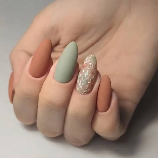 Medium Almond Matte Terracotta Moon Leaves, Close-Up Take Medium Almond Matte Terracotta Moon Leaves, Close-Up Take — Trendy Boho Nails