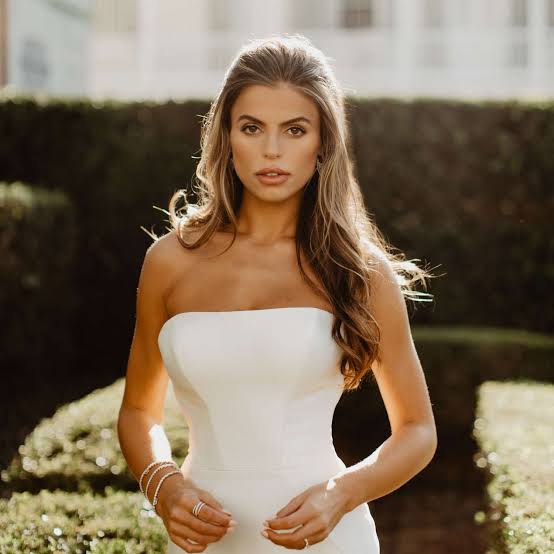 Mid-Back Balayage Blowout With Wispy Bangs — Trendy Bridal Hair