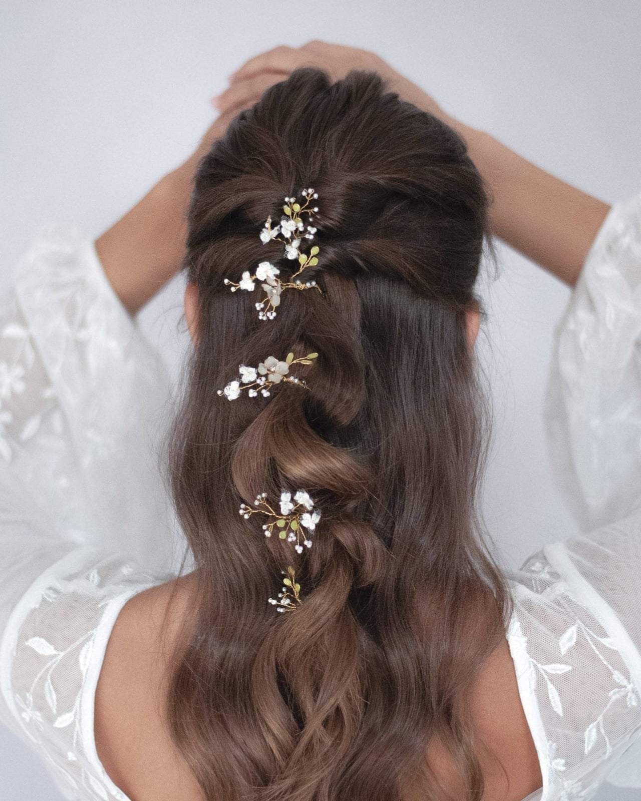 Dark Brown Braided Updo With Floral Hairpins — Trendy Bridal Hair