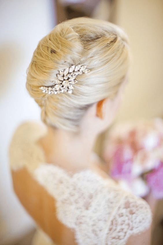 Blonde Short Chignon With Ornate Accessory — Trendy Bridal Hair