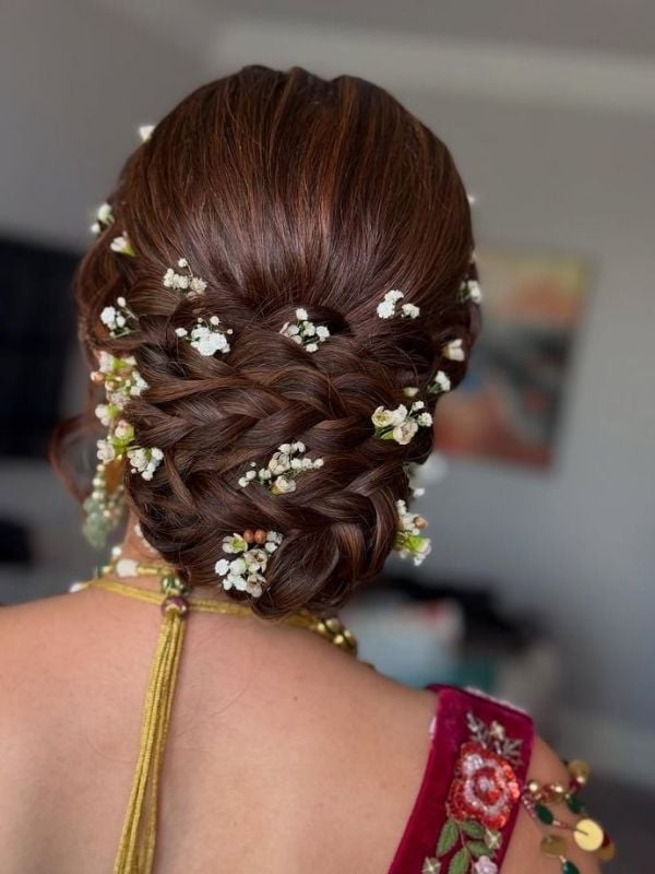 Dark Brown Updo With Woven Texture And Flowers — Trendy Bridal Hair