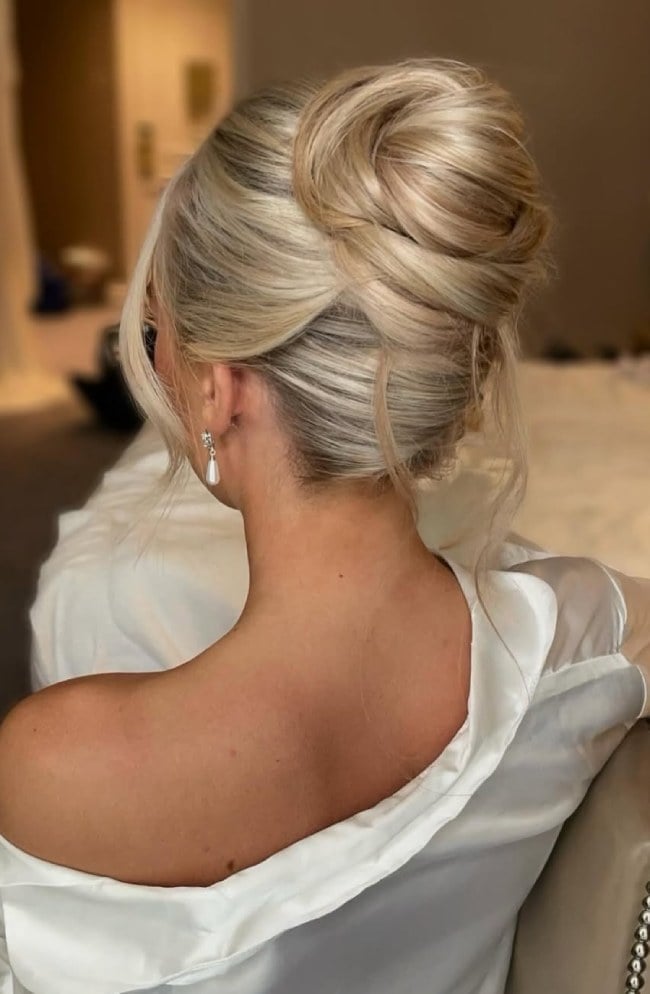 Platinum Blonde High Bun With Textured Twists — Trendy Bridal Hair