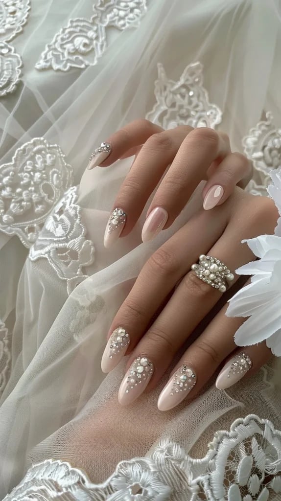 Medium Oval Milky Pink Rhinestone Pearl Embellished Nails Medium Oval Milky Pink Rhinestone Pearl Embellished Nails — Trendy Bride Nail