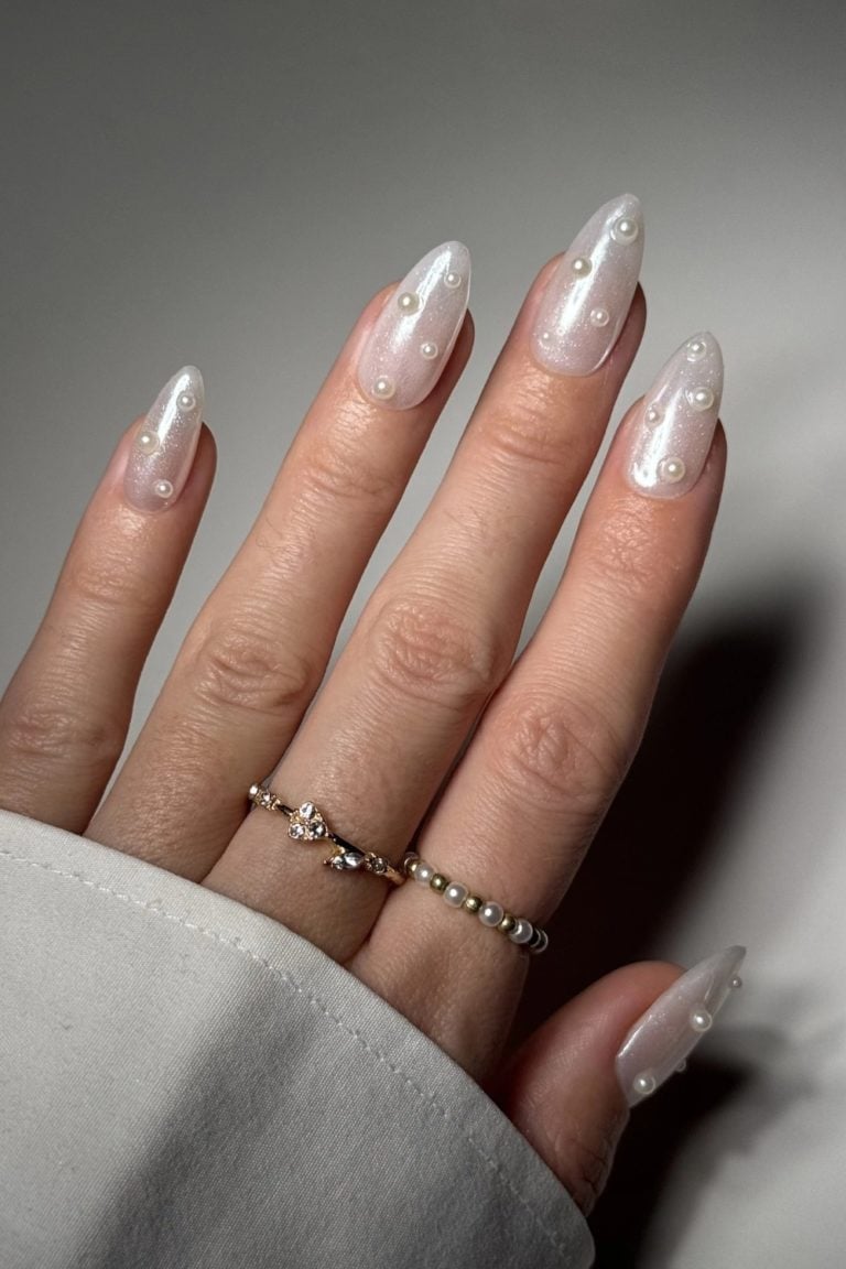 Medium Almond Sheer Nude Scattered Pearl Nails Medium Almond Sheer Nude Scattered Pearl Nails — Trendy Bride Nail