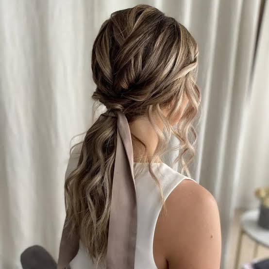 Brown With Blonde Highlights Twisted Low Bun — Trendy Bridesmaid Hair