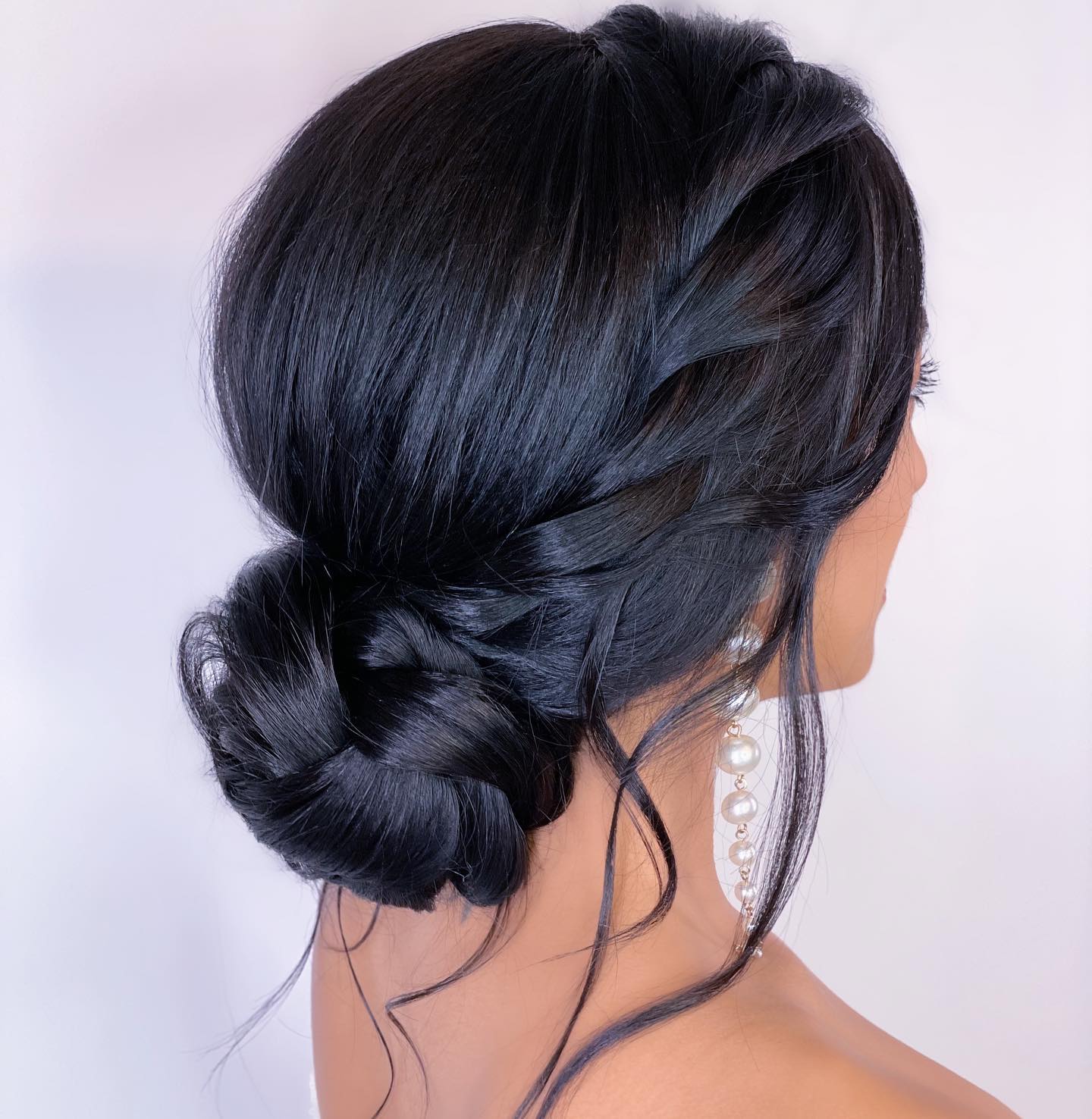 Thick Black Sleek Low Bun — Trendy Bridesmaid Hair