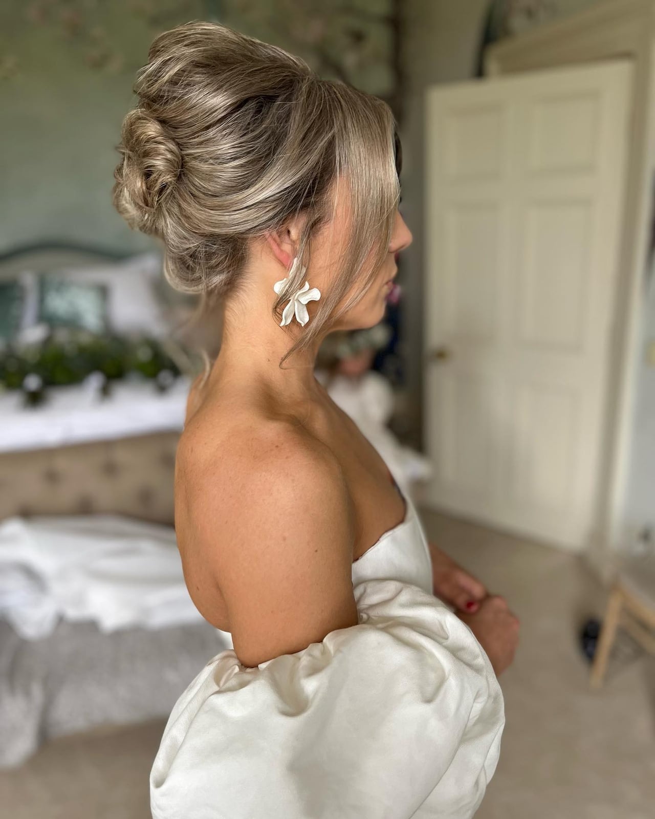 Ash Blonde Sculpted Updo With Curtain Bangs Ash Blonde Sculpted Updo With Curtain Bangs — Trendy Bridesmaid Hair Updo