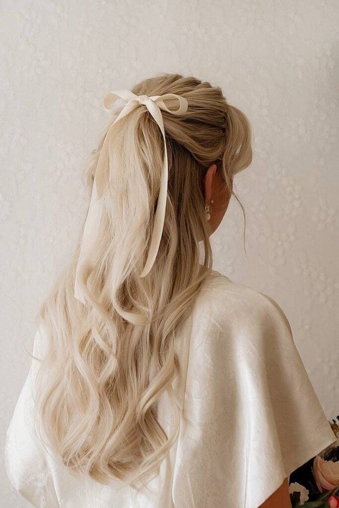 Platinum Blonde Half Up Ribbon Bow — Trendy Bridesmaid Hairstyles Down