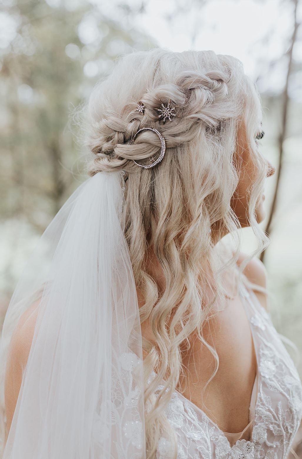 Platinum Blonde Updo With Celestial Accessories — Trendy Bridesmaid Hairstyles Down