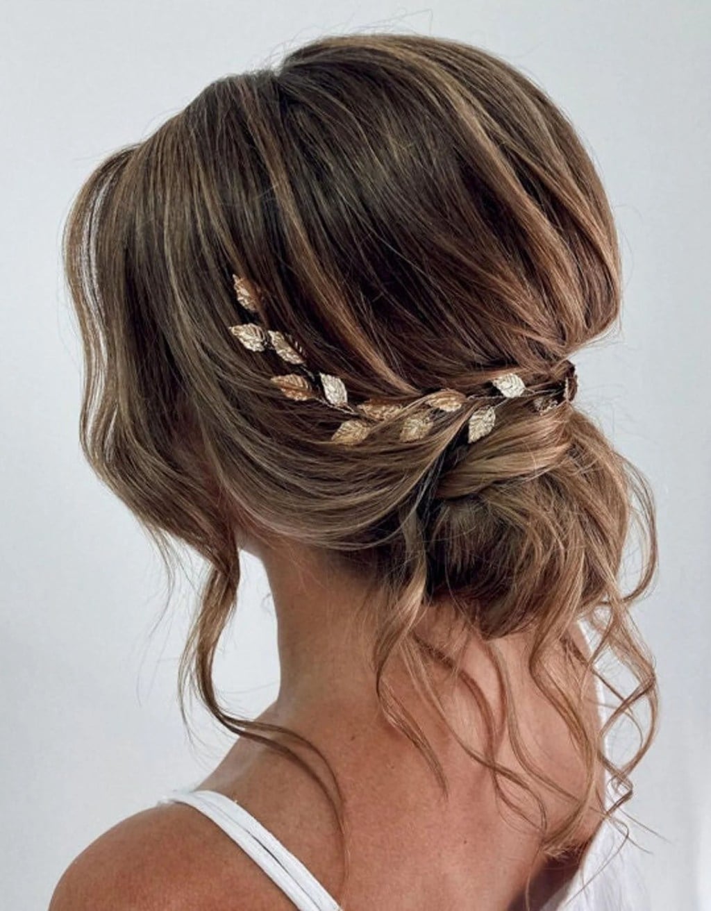 Brown Blonde Highlights Low Updo Leaf — Trendy Bridesmaid Hairstyles Updo