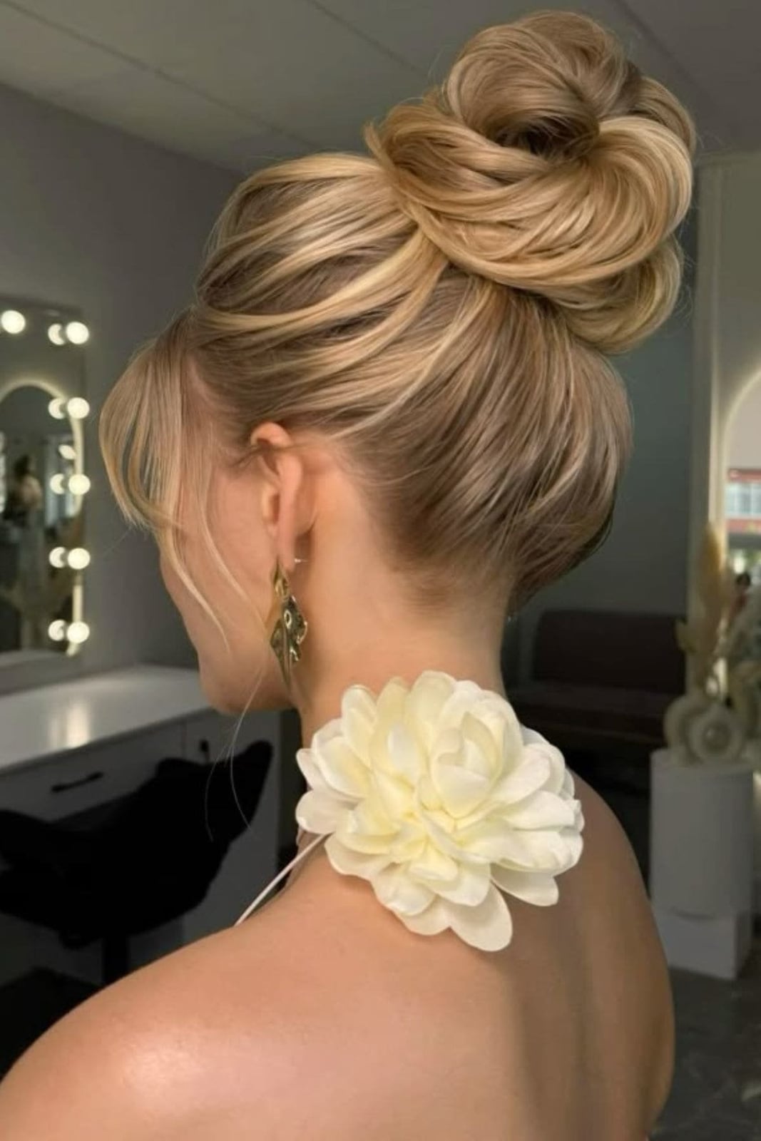 Voluminous Blonde Updo Intricate Knot — Trendy Bridesmaid Hairstyles Updo