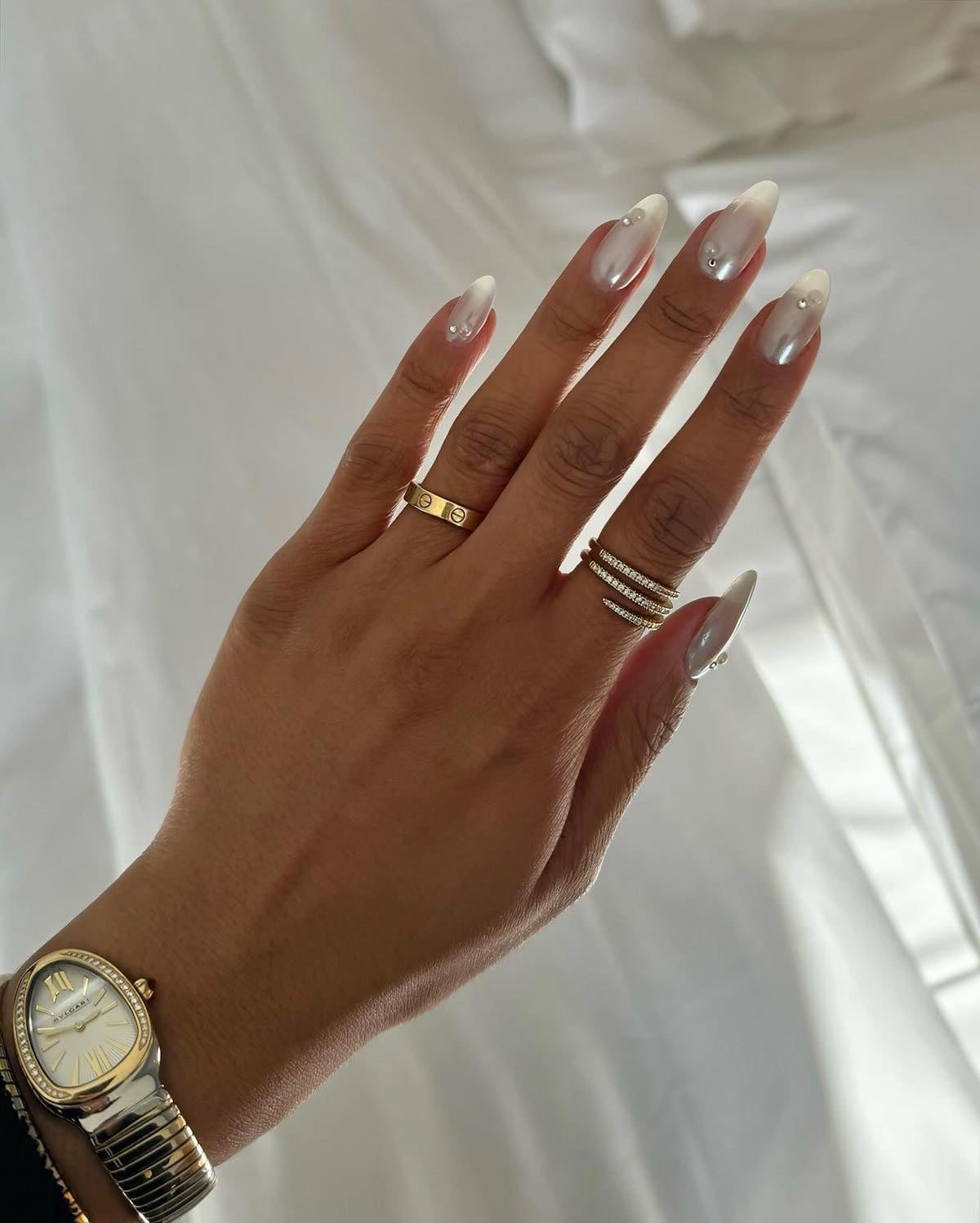 Long Almond Milky White Iridescent Pearl Rhinestone Nails — Trendy Bridesmaid Nails