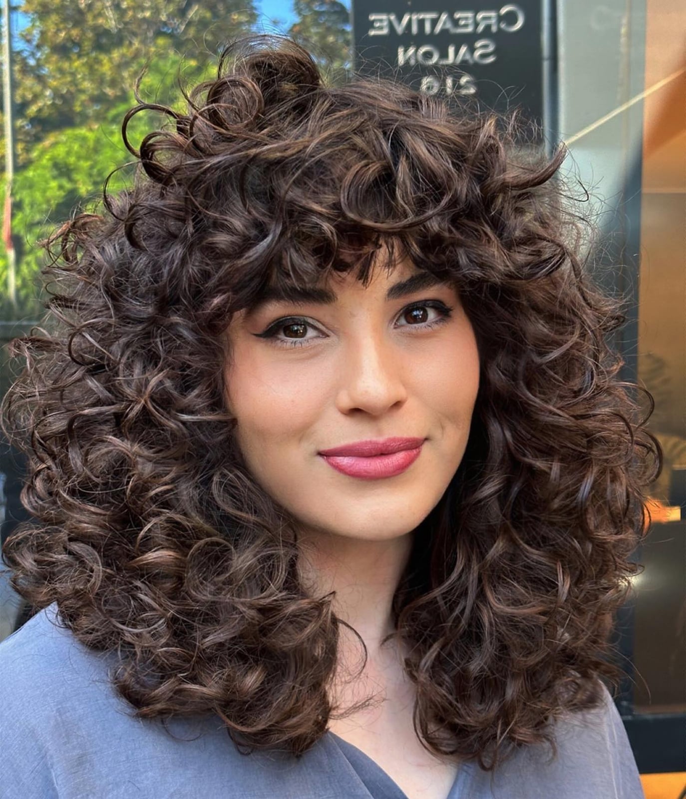 Shoulder Length Curls With Caramel Highlights Shoulder Length Curls With Caramel Highlights — Trendy Brown Curly Hair
