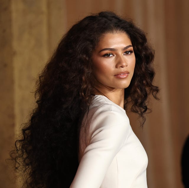 Voluminous Mid-Back Curls With Lighter Highlights Voluminous Mid-Back Curls With Lighter Highlights — Trendy Brown Curly Hair