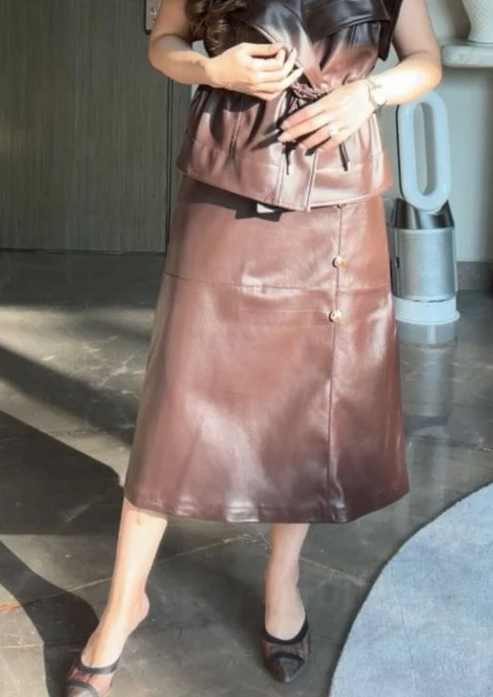 Leather Vest Over Leather Top With A-Line Midi Skirt — Trendy Brown Leather Skirt Outfit