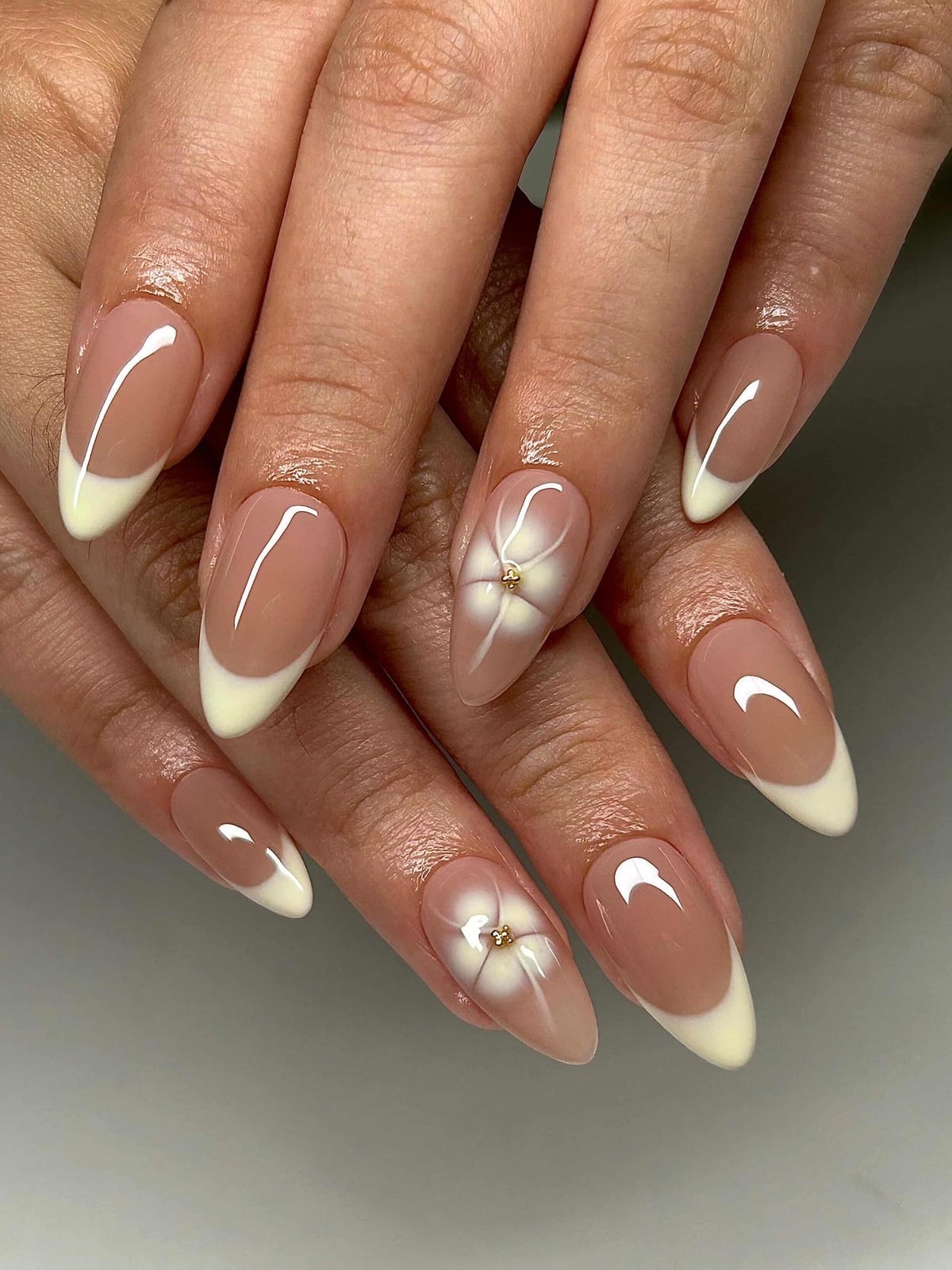 Medium Almond French Tips with 3D Flowers Medium Almond French Tips with 3D Flowers — Trendy Builder Gel Nails