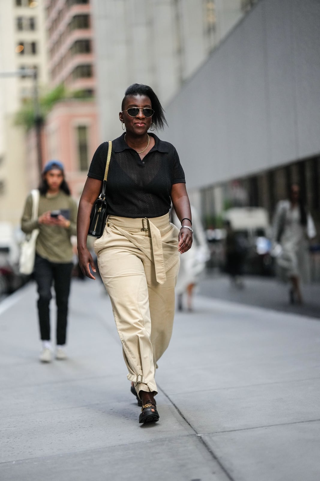 Black Polo Shirt with Beige Wide-Leg Trousers — Trendy Business Casual Outfits Black Women