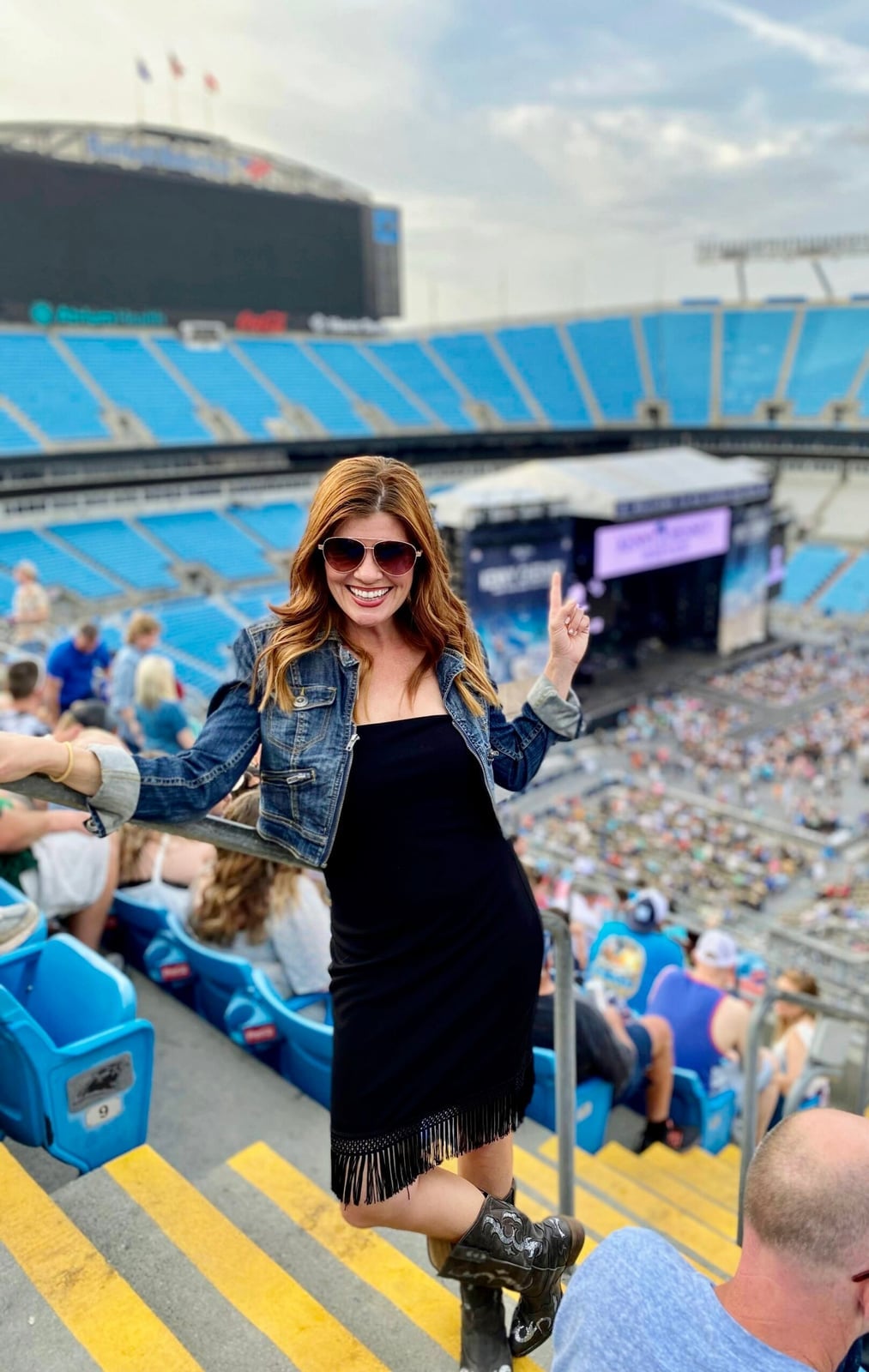 Denim Jacket Over Fringe Dress With Cowboy Boots Denim Jacket Over Fringe Dress With Cowboy Boots — Trendy Casual Concert Outfit