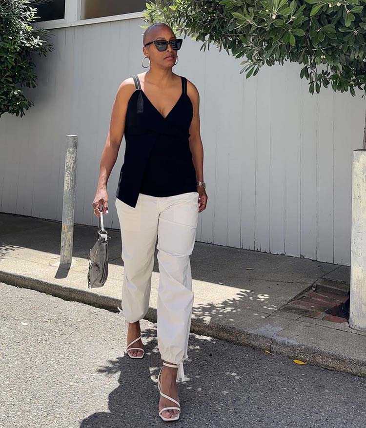 Black Wrap Top with White Cargo Pants — Trendy Casual Party Outfit