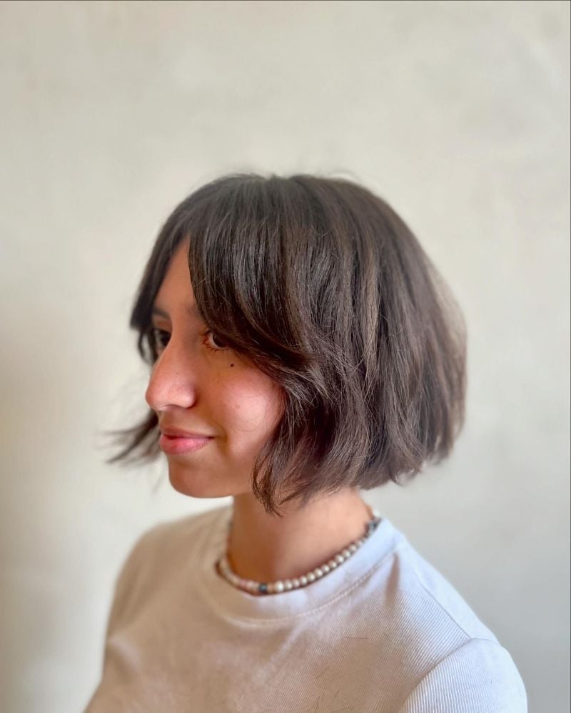 Dark Brown Bob With Wavy Texture And Curtain Bangs and Air Dried — Trendy Chin Length Hair