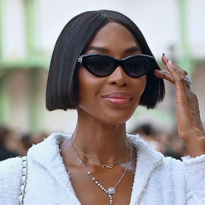 Sleek Black Blunt Bob With Middle Part — Trendy Chin Length Hair