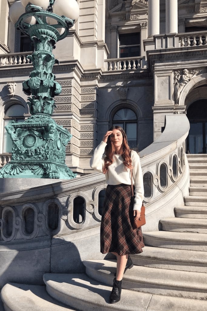 Cream Sweater with Brown Plaid Midi Skirt and Ankle Boots — Trendy Church Outfits