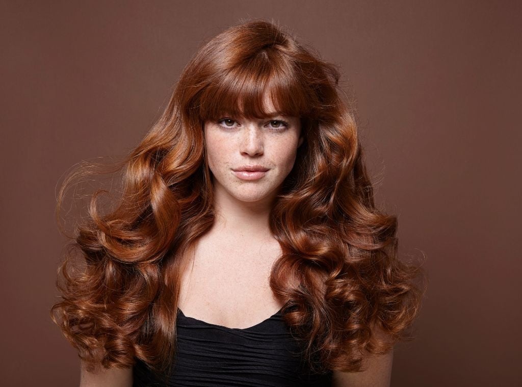 Mid-Back Vibrant Copper With Full Bangs — Trendy Copper Hair