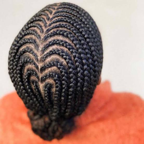 Cornrows With Heart Pattern Bun Cornrows With Heart Pattern Bun — Trendy Cornrows Hairstyles for Black Women