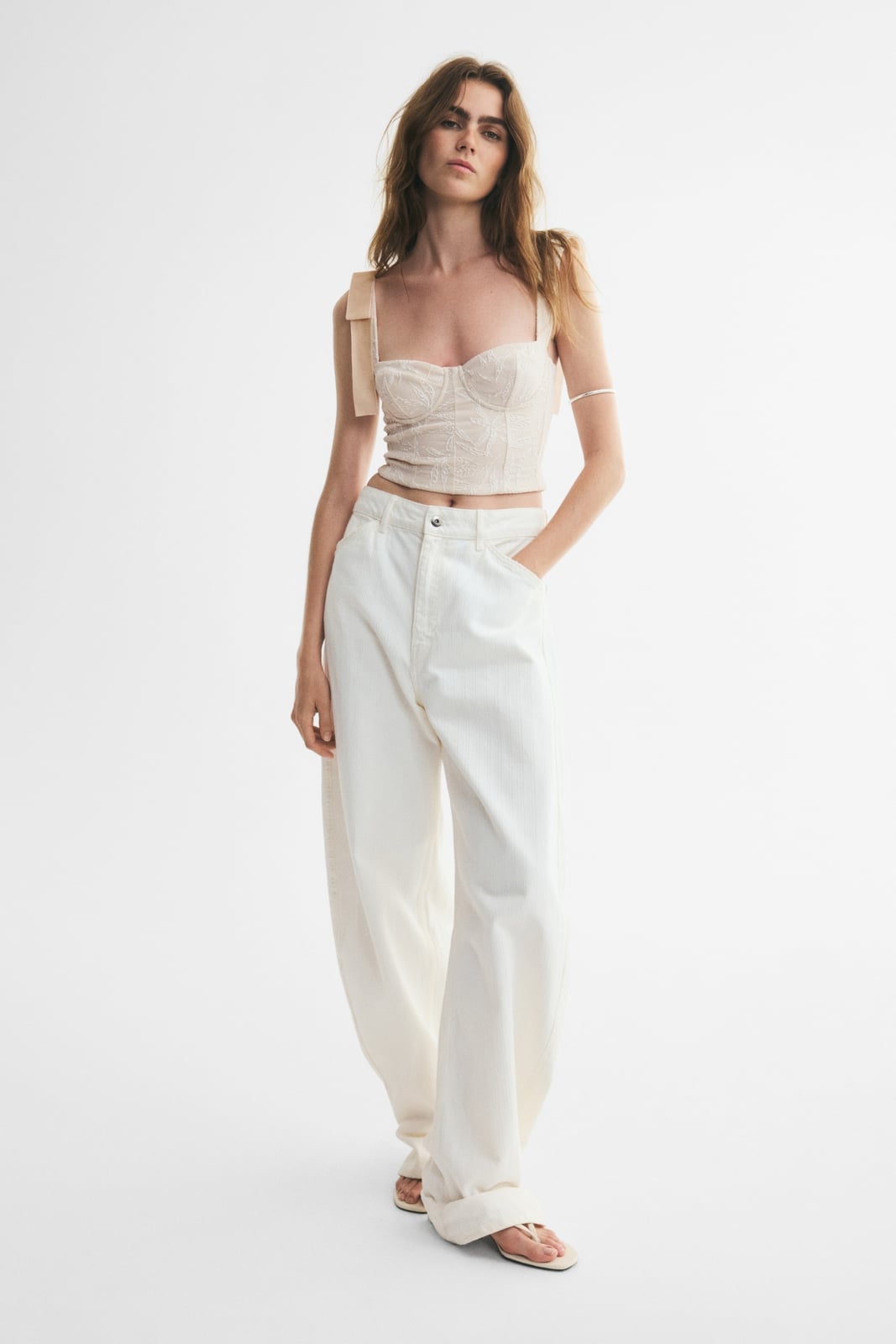 Cream Lace Corset With Bow Straps and White Jeans Cream Lace Corset With Bow Straps and White Jeans — Trendy Corset Top Outfits