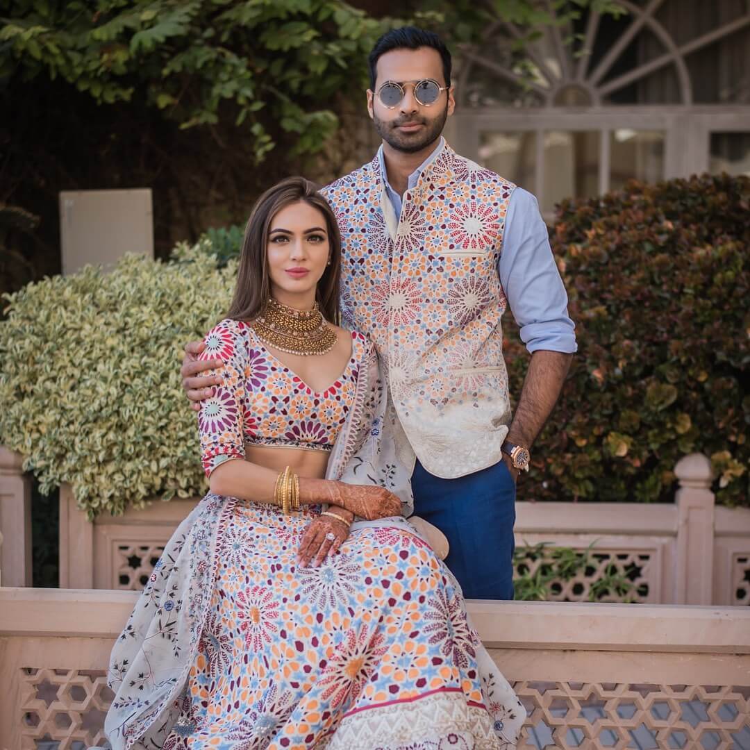 Vibrant Geometric Patterned Couple Attire Vibrant Geometric Patterned Couple Attire — Trendy Couple Outfit