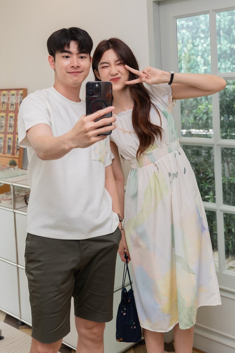White Abstract Print Dress With Casual Shorts White Abstract Print Dress With Casual Shorts — Trendy Couple Outfit